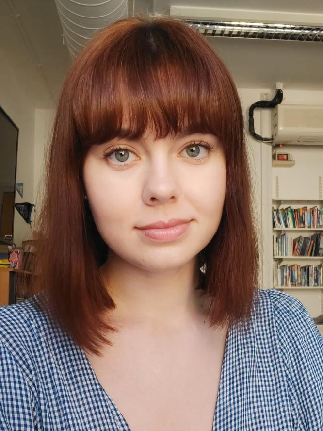 close-up of Tufts in London/Oxford Program Administrator Nicollette Kabat wearing blue shirt