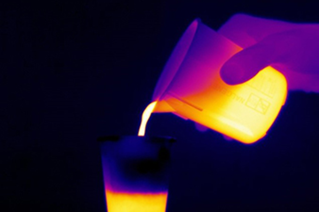 Thermal image of student pouring a liquid