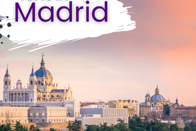 Cityscape of white buildings with blue domes, pinkish purple sky, and trees. Text reads Tufts in Madrid.